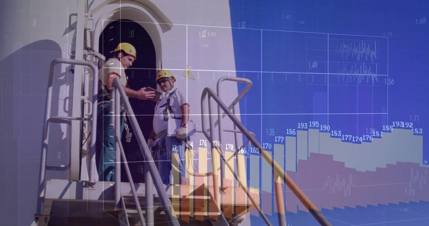 Wind Turbine Technicians Discussing Data on Tablet at Power Plant