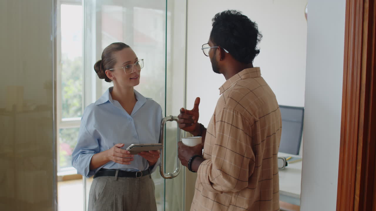 Workers Discussing Business Plan at Office Hall