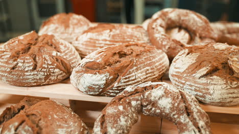 different shapes and sizes of fresh traditional sourdough bread in the bakery