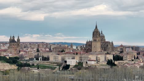 aerial drone of the city of salamanca on a cloudy day