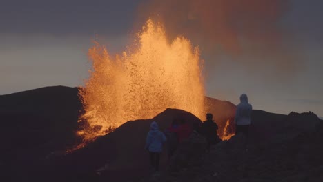 spectators watching powerful volcanic eruption iceland 2021