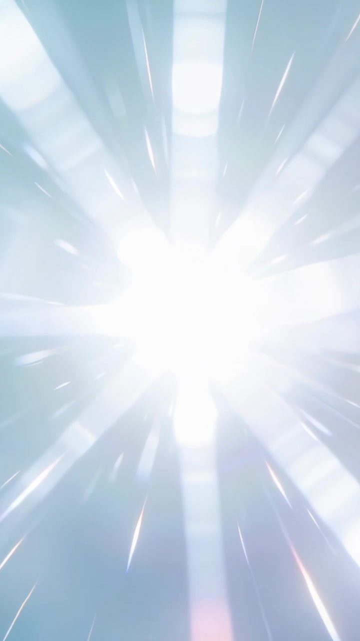 Vertical video: Appearing bright core pulsing rays across blue field as transition with lens flares