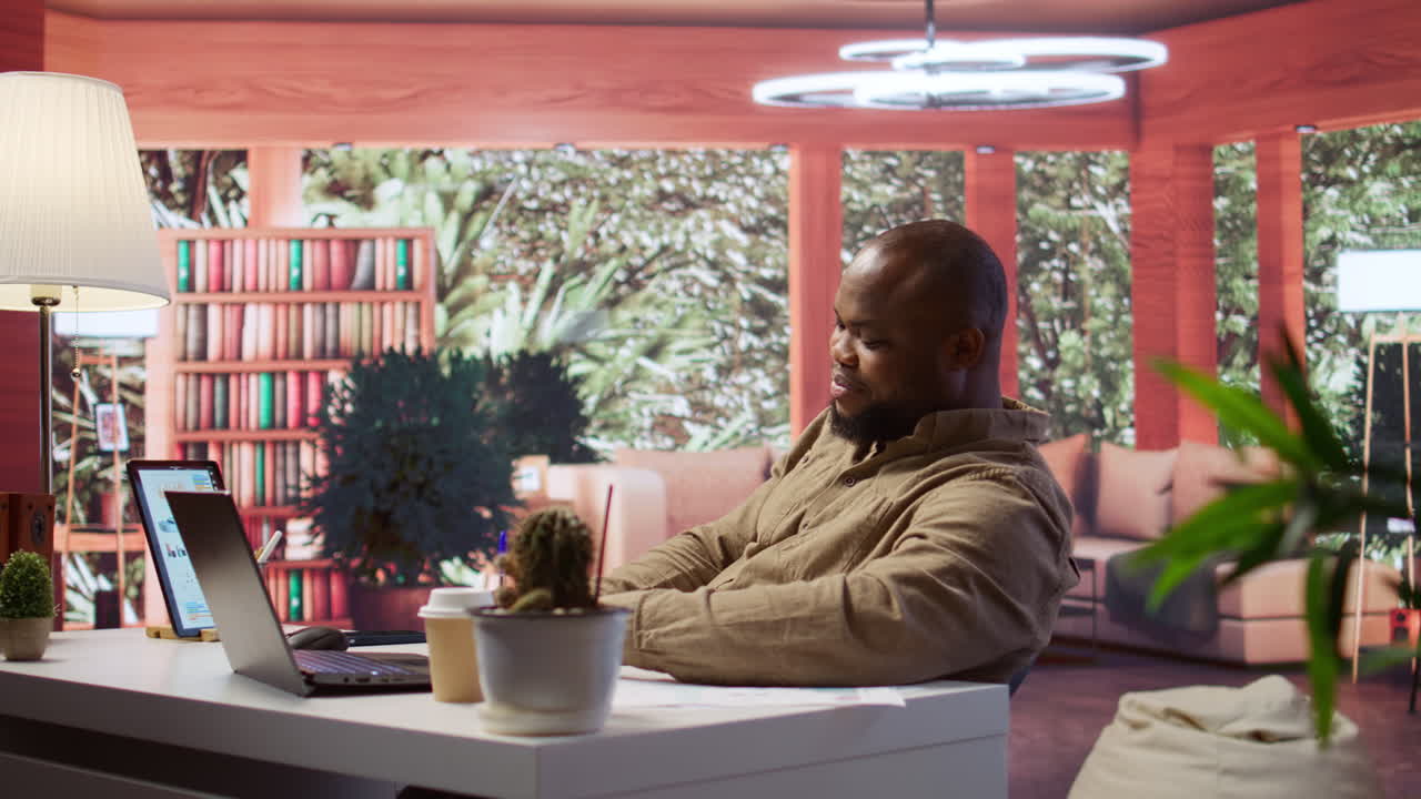 Businessman conducting a videocall meeting online with shareholders