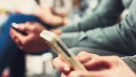 closeup of hands of businesspeople holding tech