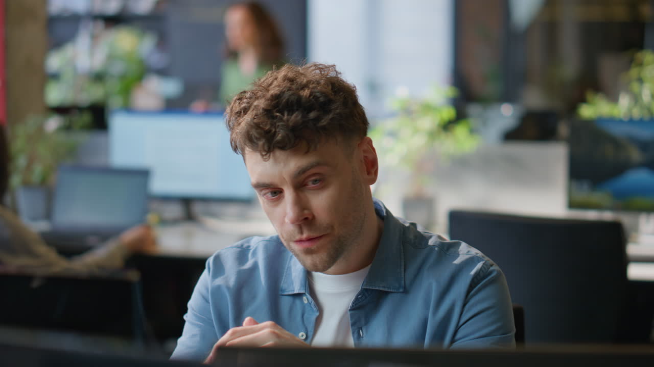 Stressed businessman thinking business problems in office closeup. Man working