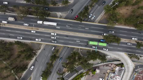 Traffic---Time-lapse-Aerial-cenital-drone-shot-of-vehicles-on-the-Periferico-Bridge-Guatemala-City