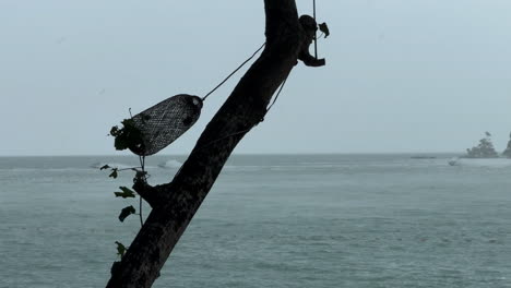 Stormy Beach Scene with Fishing Basket