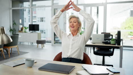 businesswoman relaxing at her desk in the office