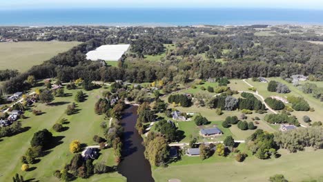 Panoramic-view-of-country-houses-of-Marayui-near-the-ocean-in-a-sunny-day