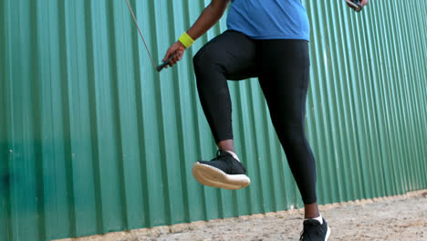 woman skipping rope in the park