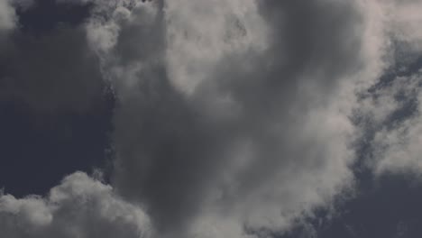 heavenly clouds forming and disappearing time lapse backlit by the spring sun