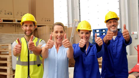 warehouse worker with thumbs up