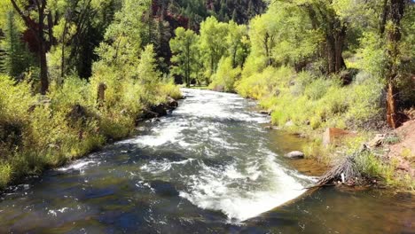 fall in colorado along the roaring fork river headed towards aspen