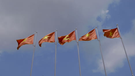 4k video of national flags of vietnam with a flag of communist party of vietnam or cpv