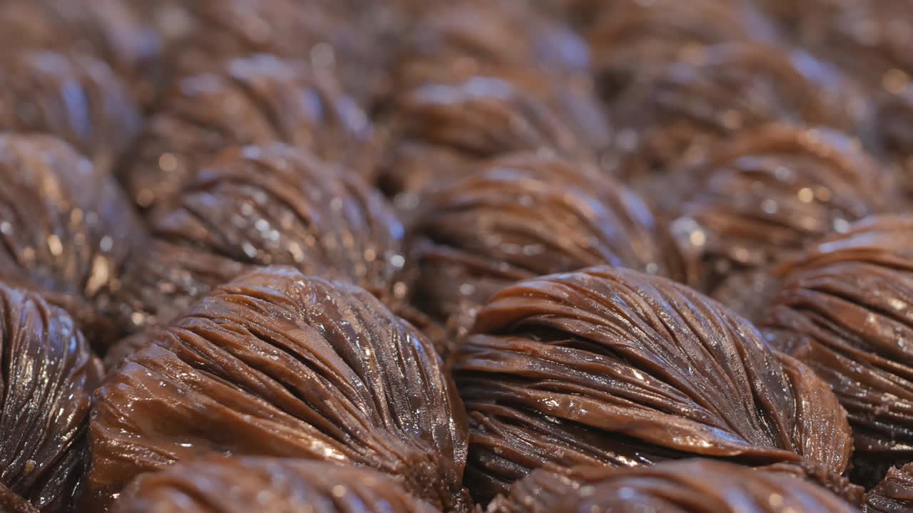 Turkish baklava with the addition of cocoa. Turkish national dessert for Ramadan. dolly shooting. 4k video