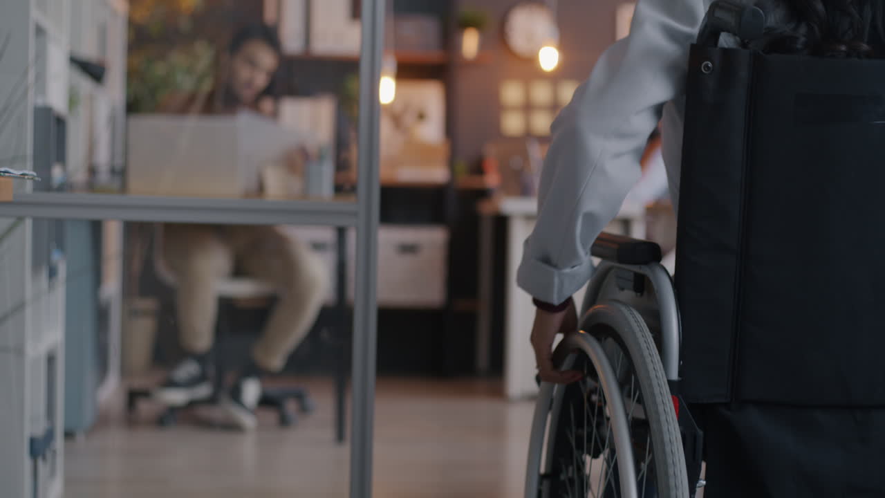 Woman in Wheelchair in Modern Office