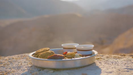 pouring coffee in the desert with makineta