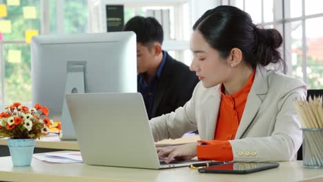 business people working at table in modern office