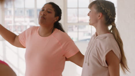 dance class best friends hugging celebrating successful practice workout having fun together in fitness studio