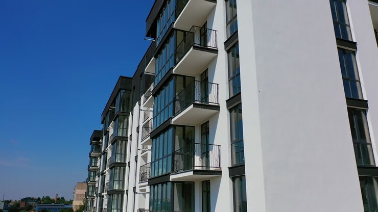 New apartment house. Detailed video on balconies of freshly built high-rise buildings. Dron video.