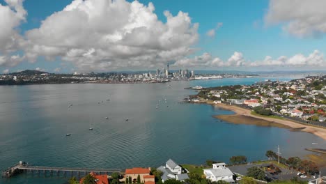 Aerial-shot-of-Devon-port-and-Auckland-skyline-with-beaches-and-boats,-New-Zealand