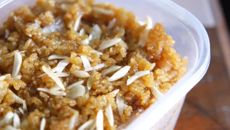 close up of indian sweet in a bowl on table.