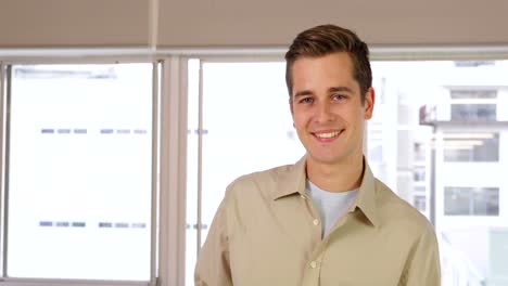 handsome businessman showing his keys