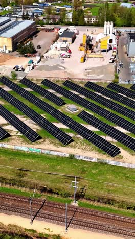 Solar panel photovoltaic panel farm green electricity production industrial park, aerial vertical