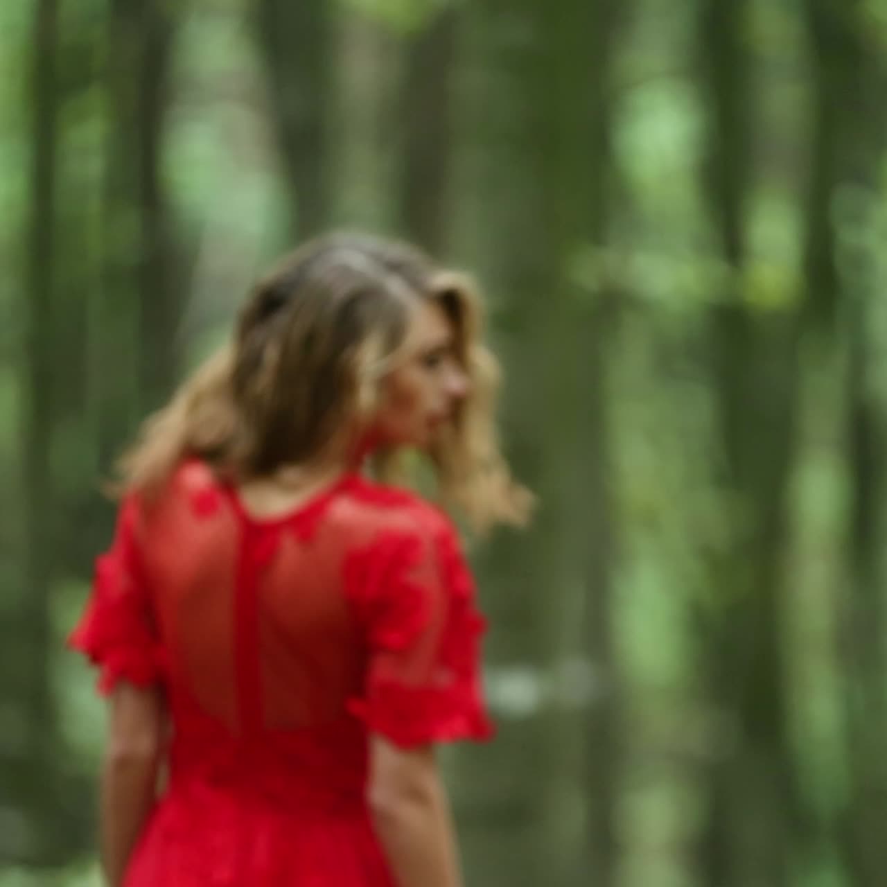 Pretty Woman Explores Beautiful Forest