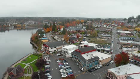 aerial view of colorful houses in coastal american town by the lake in washington