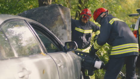 firefighters at car accident scene