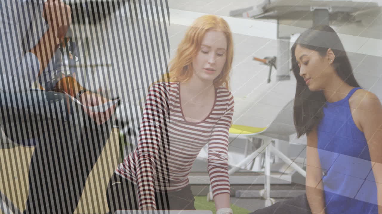 In office, women collaborating with animation of striped pattern overlay