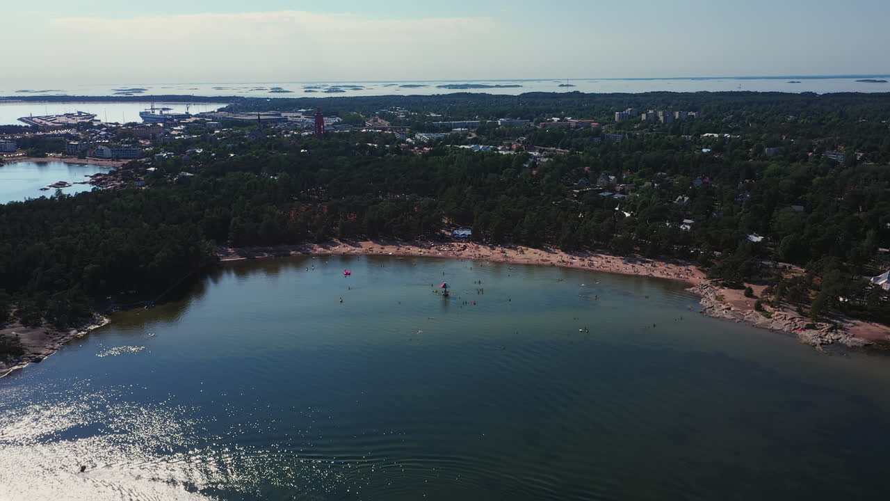 Popular Plagen Sandy Beach, Hanko on Hot Summers Day, Aerial zoom in