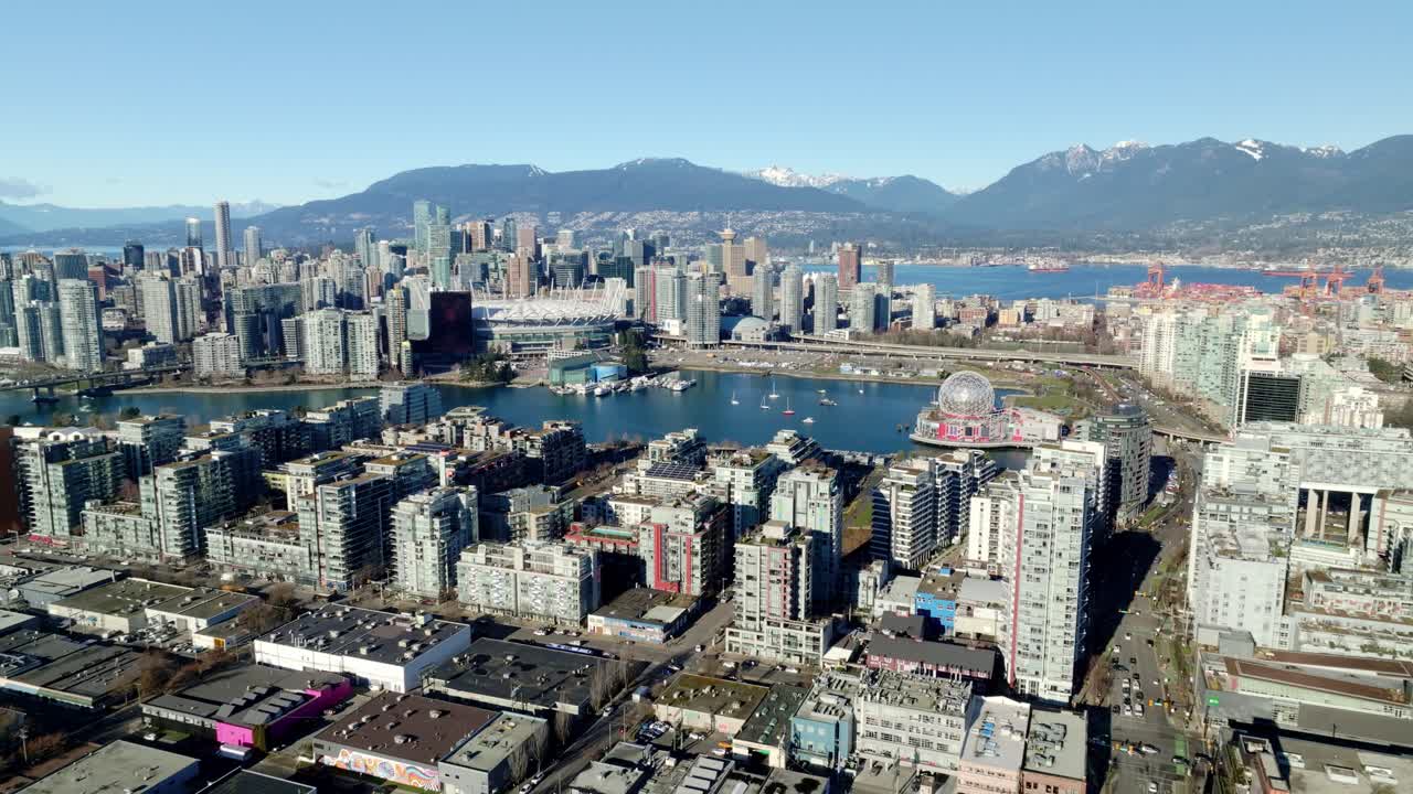 Science World Museum And Downtown Vancouver Skyline From Fairview In Vancouver, BC, Canada. - aerial shot