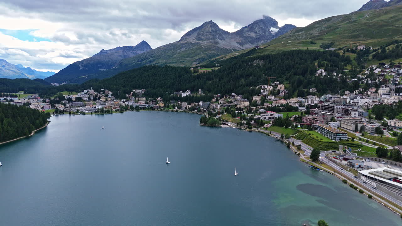Aerial view of Saint Moritz lake and town, with scenic mountain backdrop