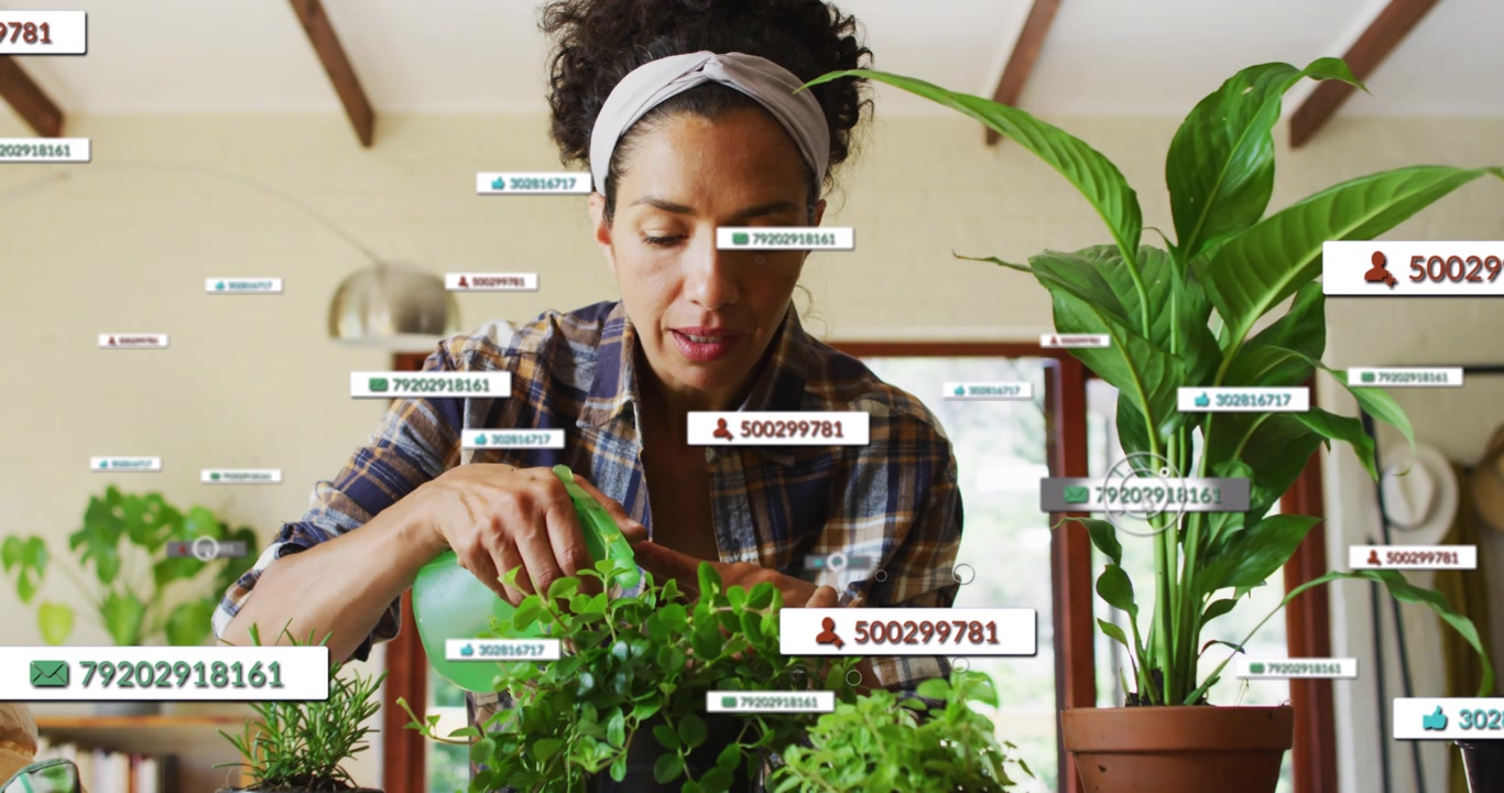 Home gardener picking sprayer for misting plants, showing viewer count, like overlays around plants