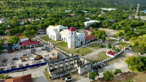 aerial view of cuartel ruins and oslob church in famous town of oslob in cebu, philippines