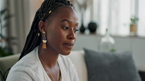 Stress,-doubt-and-black-woman-on-sofa