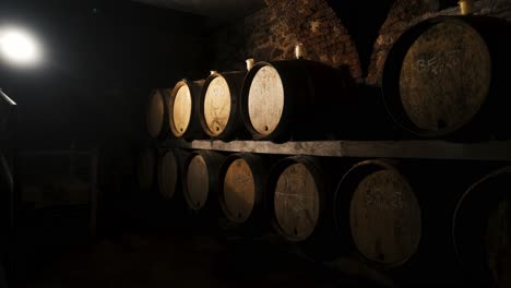 wine barrels in a wine cellar