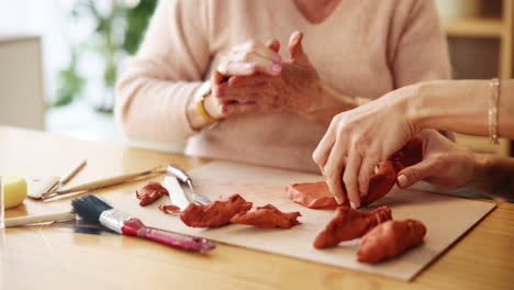 senior women engaging in clay crafts