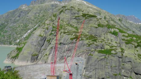 construction site, building dam wall in switzerland