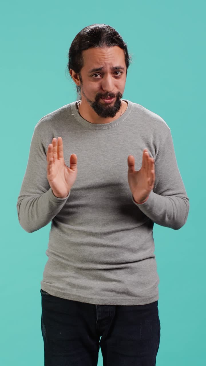 Vertical video Apologetic person doing sorry gesturing, asking for pardon