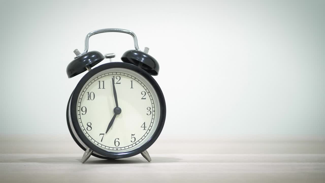 Clock motion timelapse shows passing time.