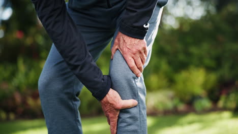 man holding his knee in pain