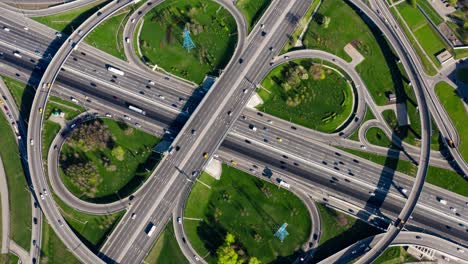 timelapse aerial view of a freeway intersection traffic trails in moscow.