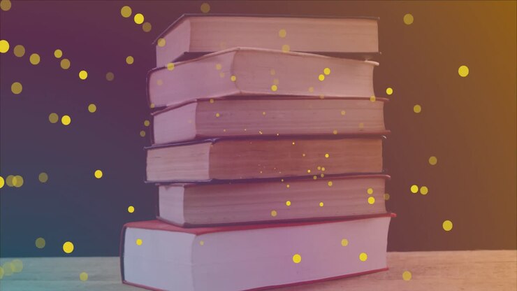 Animazione di macchie gialle su libri su sfondo nero