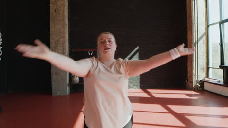 woman dancing indoors