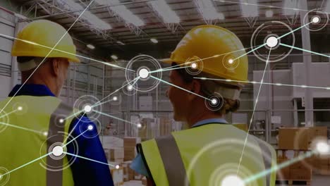 Animation-of-network-of-connections-over-men-working-in-warehouse