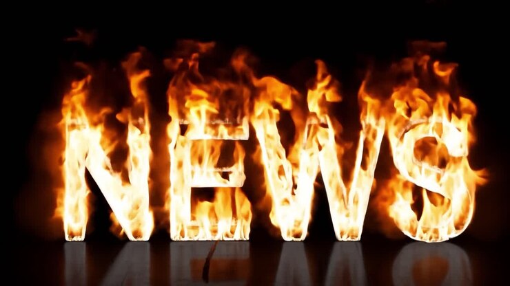 Fire burns on a black background, engulfing the word news in bold white capital letters