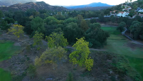aerial drone of san vicente golf course in ramona california during sunrise
